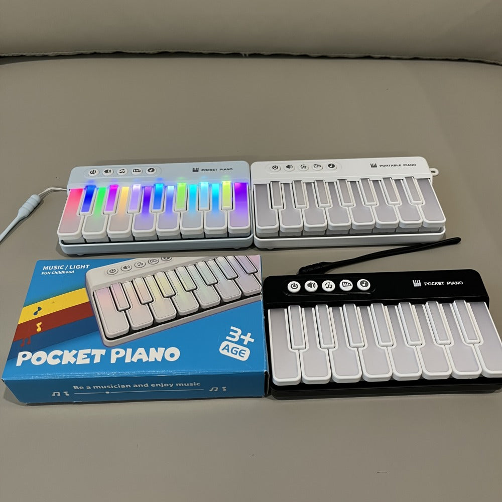 Mini Piano Keyboard, Pink ZJKDQFEN-1, Portable, Pocket-Sized for Basic Music Play