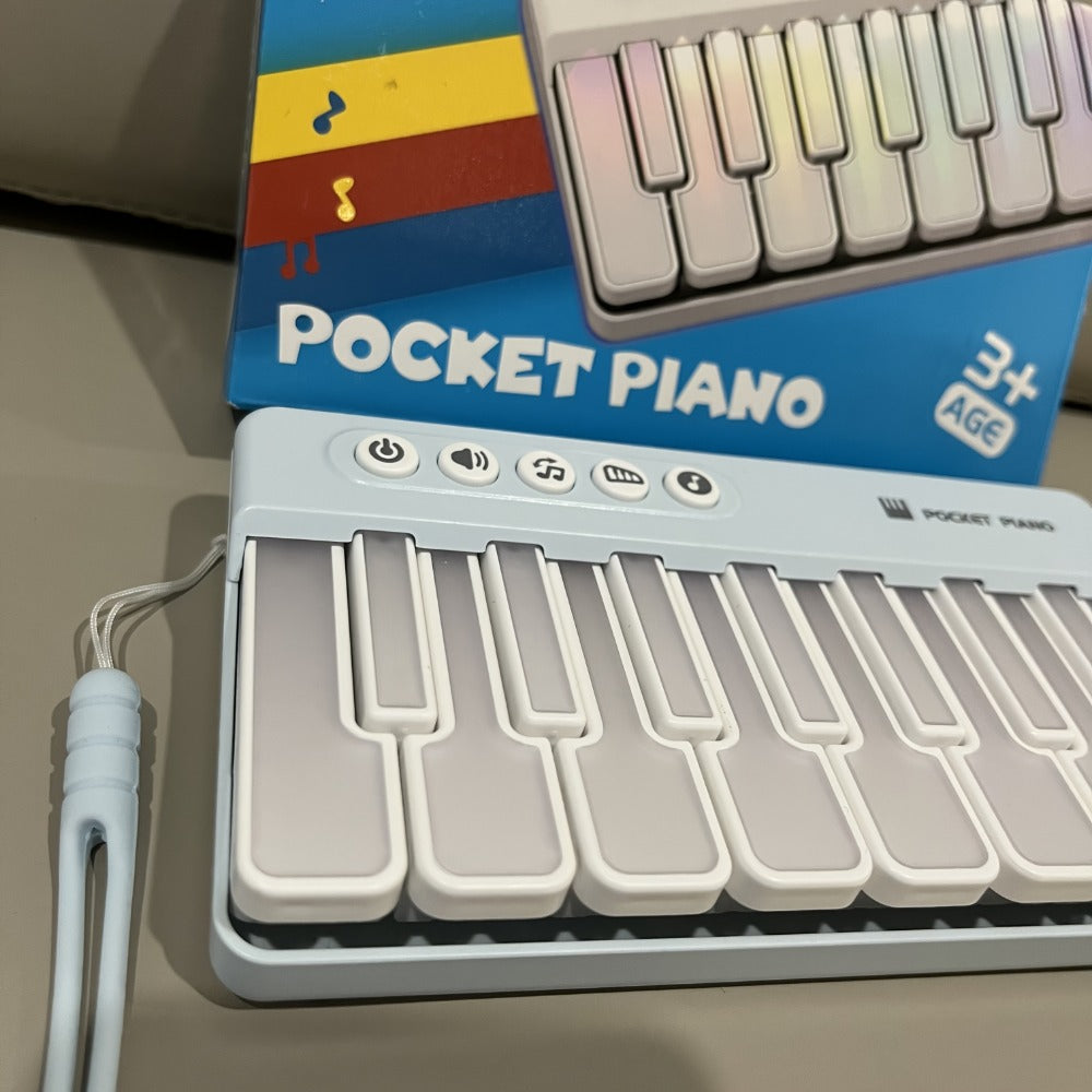 Mini Piano Keyboard, Pink ZJKDQFEN-1, Portable, Pocket-Sized for Basic Music Play